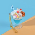 Blue sundae ice cream keychain with white cream and blue liquid in transparent cup - Blue