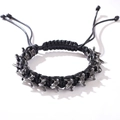 Pulsera punk gótica de cordón trenzado negro con motivo de hueso de dragón plateado - Pulsera trenzada de hueso de dragón negro
