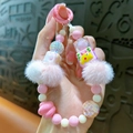Chaîne de téléphone licorne en peluche rose avec perles colorées et pompon - Rose