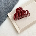 Macro shot of glossy deep red hair claw clip on beige textured fabric display - Wine Red - Pumpkin Shape Claw (9.3cm)