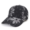 Detailed close-up of floral lace pattern on the side of a breathable mesh baseball cap - Plain Lace Style / Black