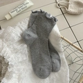Grey knit mid-calf socks with elegant ruffle edge trim and vertical ribbed texture - One Size / Light Gray
