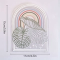 Rainbow suncatcher window film with monstera leaves measuring 11cm x 15cm - RPS063: Rainbow Monstera Leaf