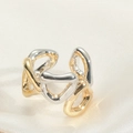 Minimalist open ring featuring interlocking gold and silver tones in a geometric design - Hollow Style