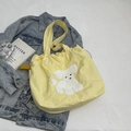 Borsa tote gialla con coulisse e toppa a forma di cucciolo su sfondo denim - Patch Cucciolo / Giallo