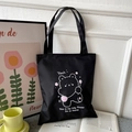 Minimalist black oxford tote bag featuring a cute cartoon bear and white text print - Black with Yeah Bear Print