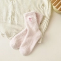 Chaussettes roses chaudes en peluche avec broderie nœud et texture douce polaire - Taille unique / Rose Clair