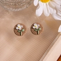 Handmade daisy floral stud earrings with white petals on brown base and green leaves - Brown Base Handmade Daisy Studs