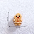 Miniature resin gingerbread man with bite detail, measuring 1.6cm by 1.1cm for DIY snow scenes - 17# Small Gingerbread Man (Light)