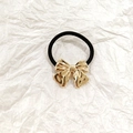 Elastic hair tie with a hollow golden bow ornament and a durable black stretch band - Gold Butterfly 3.5cm