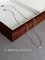 Close-up of a silver 925 lip chain necklace on a wood box, length 41+5cm - Style 13: Silver Lip Link Chain 41+5cm