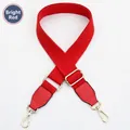 Detail of bright red canvas strap with gold swivel hooks and adjustable buckle - Red Strap-Red Leather / Light Gold Buckle