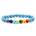 Blue turquoise beaded bracelet with seven chakra stones and golden alloy spacers - Lake Blue Pine Stone Chakra Bracelet