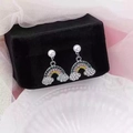 Rainbow shaped silver earrings with colorful rhinestones and faux pearls on black velvet - Silver Rainbow Pearl Studs