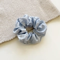 French vintage light blue scrunchie with metallic silk sheen on beige knit background - Medium / Blue