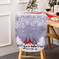 Close-up of Christmas gnome chair cover with snowflake patterns on fabric - Grey Faceless Gnome Chair Cover