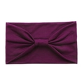 Elastic cotton yoga headband in solid purple color with stylish center knot detail - Purplish Red