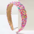 Detail showing colorful sprinkles texture and soft velvet lining of the wide headband - Rose Gold Rainbow