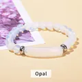 Elegant opal beaded bracelet with silver accents and smooth white gemstones - Opal