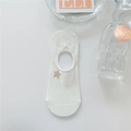 Close-up of white cotton invisible sock with gold star embroidery and ribbed cuff details - One Size / Star Embroidery