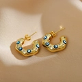 Detailed shot of C-shaped gold earrings with colorful enamel devil eye and clear zircons - Multi-color Enamel Style / Gold