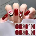 Detailed view of Christmas gel nail stickers with Santa Claus and red checkered patterns - CS432
