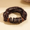Detail of multi-layer wood bead bracelet featuring coconut shell and vintage ethnic design - Coffee - Layered Style