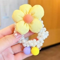 Cute yellow flower hair tie for girls featuring white pearls and colorful beads - Yellow Pearl Flower
