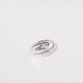 Silver stainless steel oval ring featuring etched floral tulip patterns on an open band - May / Birth Flower Ring