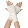 Detailed knit texture of cable pattern fingerless gloves in cream white acrylic - One Size / White