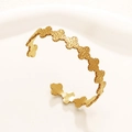 Bracciale rigido aperto a quadrifoglio in oro acciaio inox con finitura martellata - 04 Oro
