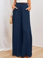 Détail du pantalon large bleu foncé à taille haute avec cordon et tissu texturé élégant - Bleu Marine
