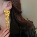 Detailed close-up of a gold floral tassel earring featuring tiered metallic flowers and leaves - Matte Gold Metal Floral (3#)