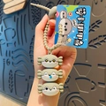 Cartoon seal cable protector keychain with three stacked heads and grey spiral cord - Grey Sacabambaspis Stack