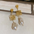 Macro shot of gold hollow anagram earrings with high-quality baroque pearls on display - 16# Gold Baroque Logo Pearl (Silver Earring Post)