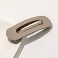 Close-up of matte khaki duckbill hair clip with minimalist rectangular cutout design - Matte Hair Clip Large - Milk Coffee