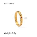 Makroaufnahme: 3mm goldener Edelstahlring mit bunten Zirkonia-Stern-Inlays - US 6 / Gold