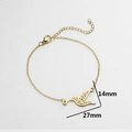 Minimalist gold hummingbird charm bracelet with 14mm by 27mm hollow bird pendant design - Gold