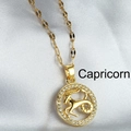 Collier pendentif Capricorne doré avec oxydes de zirconium sur soie blanche - Capricorne