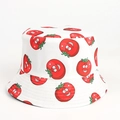 Close-up of a white bucket hat with cute cartoon tomato prints and smooth cotton texture - Tomato