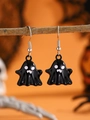 Detailed close-up of ghost earrings for Halloween with black and white enamel finish - Black