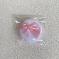 White velvet powder puff with a pink ribbon bow detail in transparent packaging - OPP Bag / Small (55*15MM)