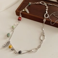 Detail of vintage ethnic long necklace with colorful ceramic beads and leaf pendants - Waist Chain-Silver-Multicolor