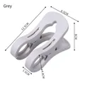Clip grande de plástico gris claro para edredones con doble resorte metálico 12,5 cm - Gris