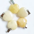 Five light yellow heart-shaped natural stone pendants with secure metal bails - Topaz