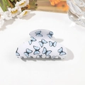 Detail of white butterfly hair claw clip with blue patterns and transparent teeth - 8cm Square Head / Light Blue Butterfly