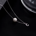 Elegant S925 silver necklace featuring a round white pearl and a sparkling letter C charm - Letter C