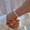 Handmade double-layered bracelet with natural freshwater pearls and gold beads on a wrist - Irregular Baroque Pearl Style (KB0136)