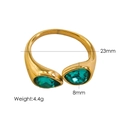 Bague ouverte en acier titane doré ornée de deux pierres précieuses vertes poire - Vert Paon