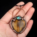 Handcrafted copper wire wrapped pendant featuring tiger eye stone and abalone shell - Tiger's Eye
